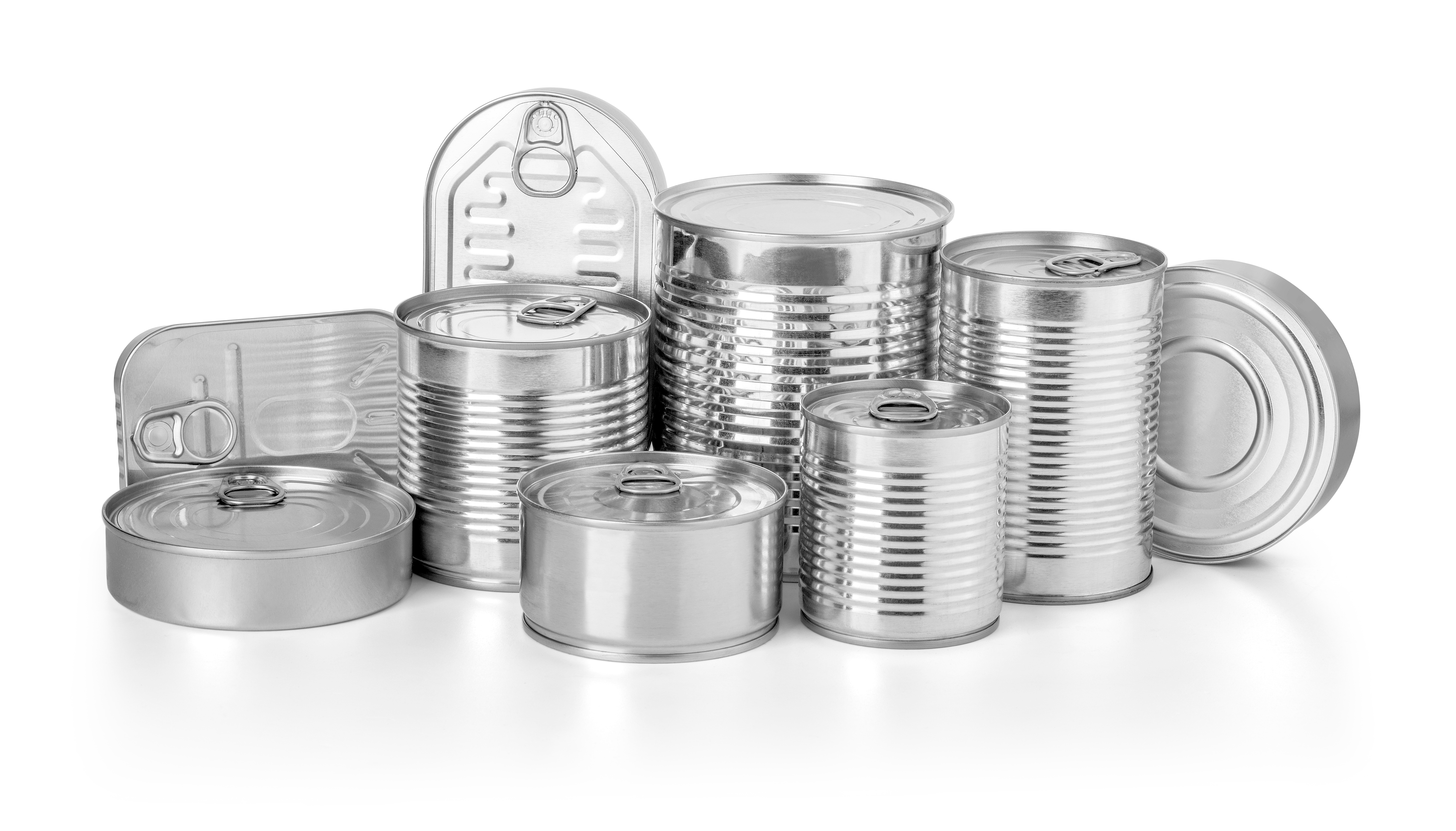 Different silver food cans on white background